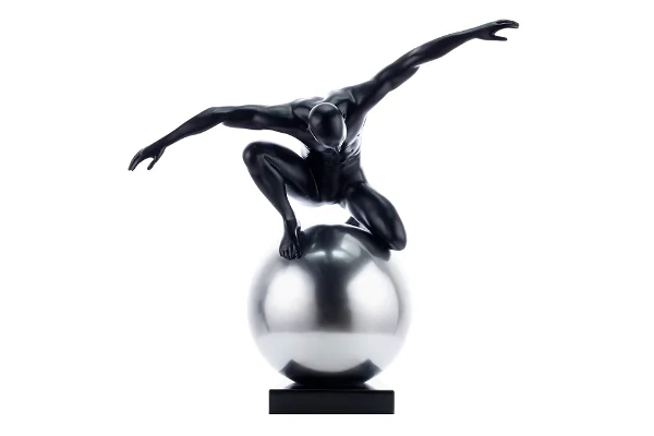 Athletic figure on sphere, black and silver, dynamic balance pose.