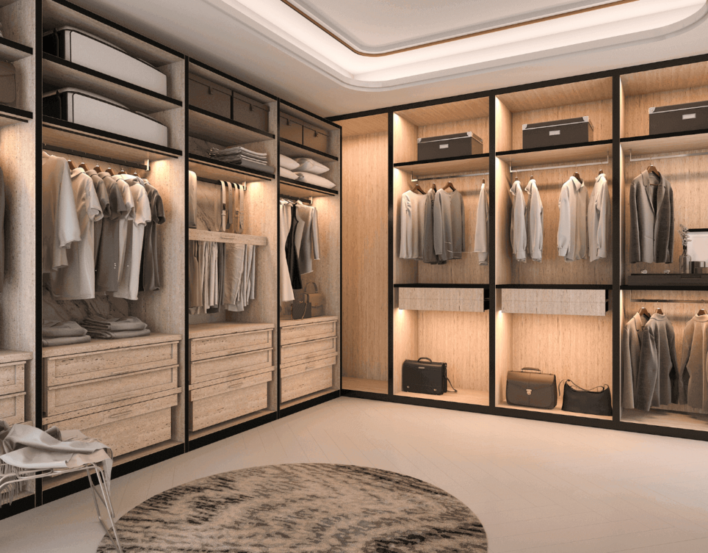 A customized walk in cabinet with glass doors and hanged clothes