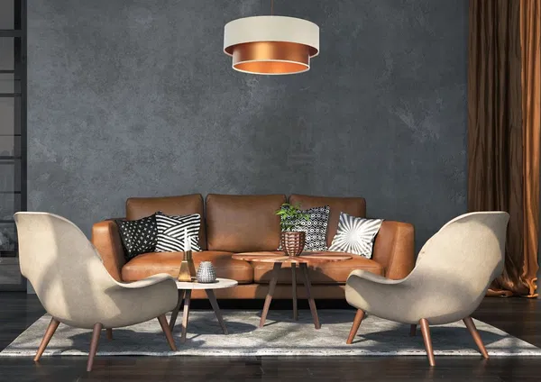 Stylish living room with a brown leather sofa, beige armchairs and a modern pendant light with copper accent