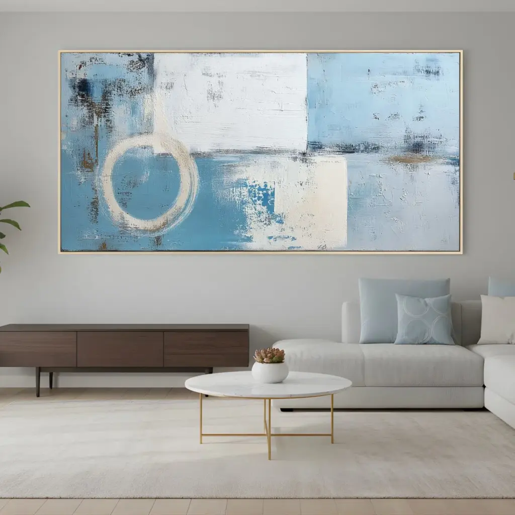 Abstract blue and white horizontal diptych above low console